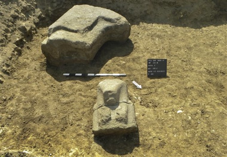 This photo taken Thursday, Feb. 17, 2011 and released by the Supreme Council of Antiquities on Tuesday, April 26, 2011, shows a six foot (1.85 meters) tall statue of the lion-headed goddess Sekhmet in Luxor, Egypt. Archeologists unearthed one of the largest statues to date of the powerful ancient Egyptian pharaoh Amenhotep III at his mortuary temple in the southern city of Luxor, as well as one of the god Thoth with a baboon's head and and a six foot (1.85 meters) tall one of the lion-headed goddess Sekhmet, the country's antiquities authority announced Tuesday. (AP Photo/Supreme Council of Antiquities) ** EDITORIAL USE ONLY, NO SALES **